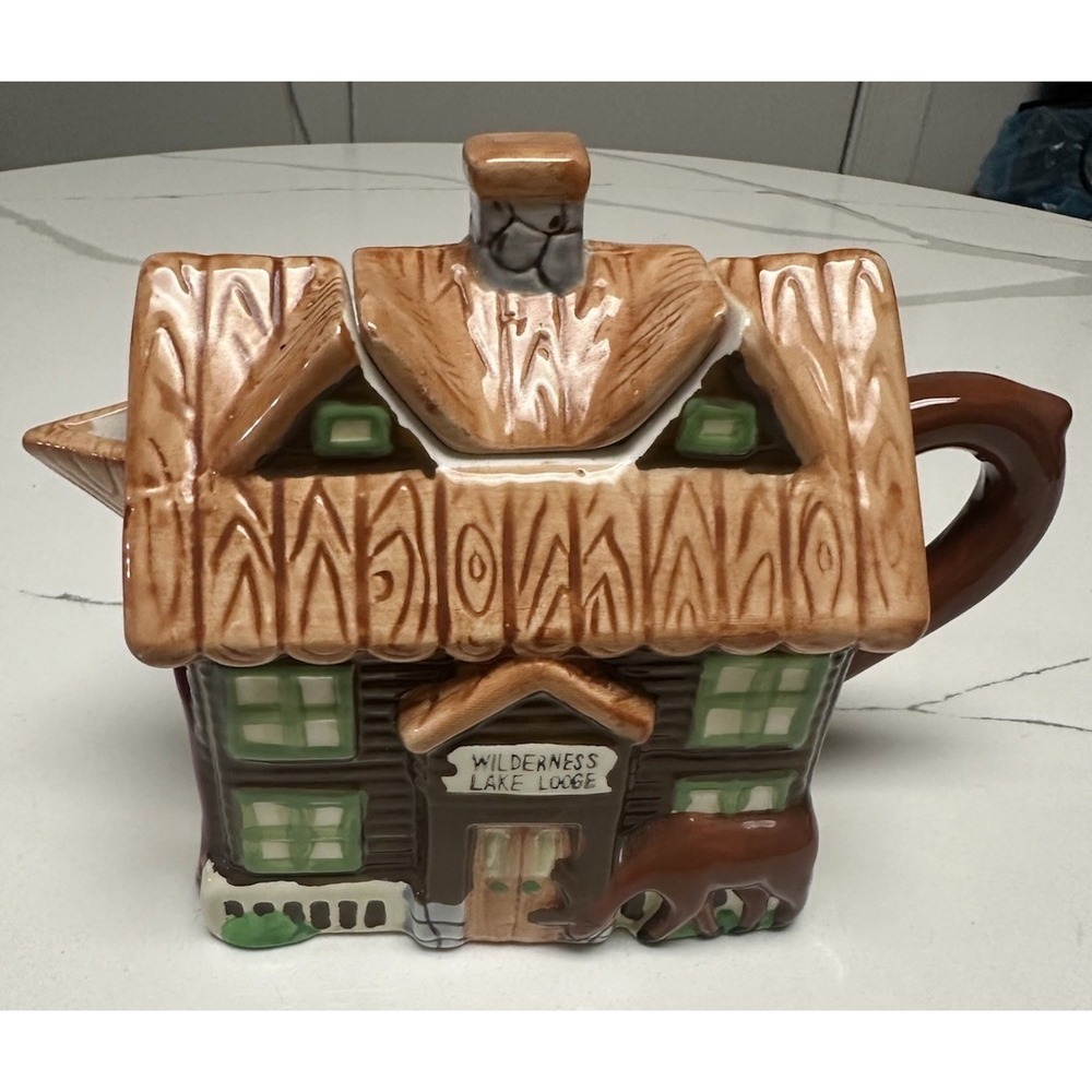 Vintage Wilderness Lake lodge teapot cabin, deer, fishing, canoes by Designpac.